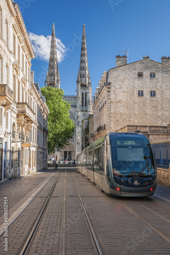 Bordeaux Cathedral (Cathedrale Saint Andre) seen from Vital Carles street with bordeaux tram in France photo