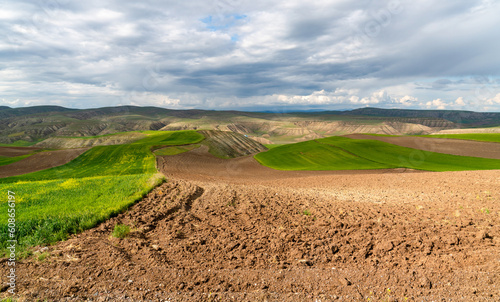 Farming on eroded soils and green crops and fallow lands in central Turkey.