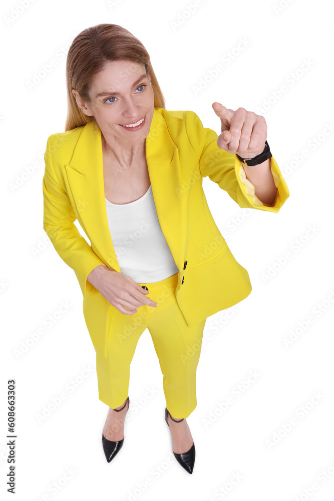 Beautiful happy businesswoman pointing at something on white background, above view Beautiful happy businesswoman pointing at something on white background, above view