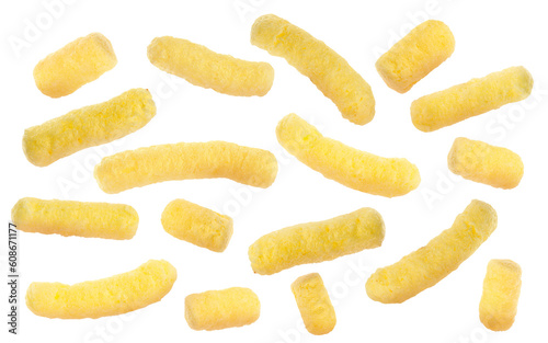 Many tasty corn sticks falling on white background