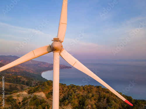 Energy windmill producing electric power zero emissions, close-up aerial shot