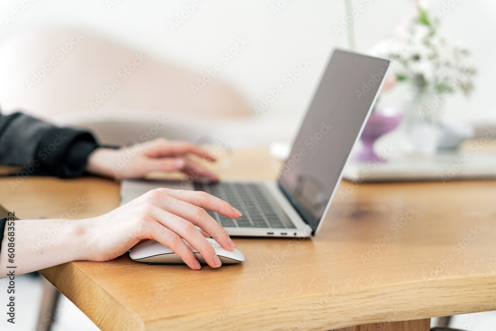 The financier uses a laptop, Works surfing the Internet online site for analytics. The financier uses a laptop, Works surfing the Internet online site for analytics.