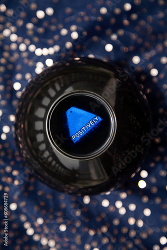 Magic ball game for predicting the future says Positively to a question. Fortune telling toy giving a positive answer