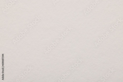 Texture of white paper sheet as background, top view