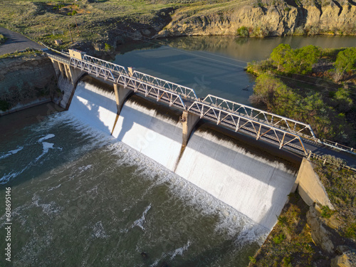 River water dam during sunset from aerial drone for water rights photo