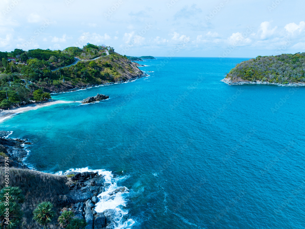 Aerial view of beautiful tropical beach and sea with coconut palm trees in Phuket island Thailand,Beautiful sea travel and vacation at Yanui Beach Phuket Thailand