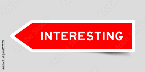 Red color arrow shape sticker label with word interesting on gray background Free Download Red color arrow shape sticker label with word interesting on gray background - GFXLoad