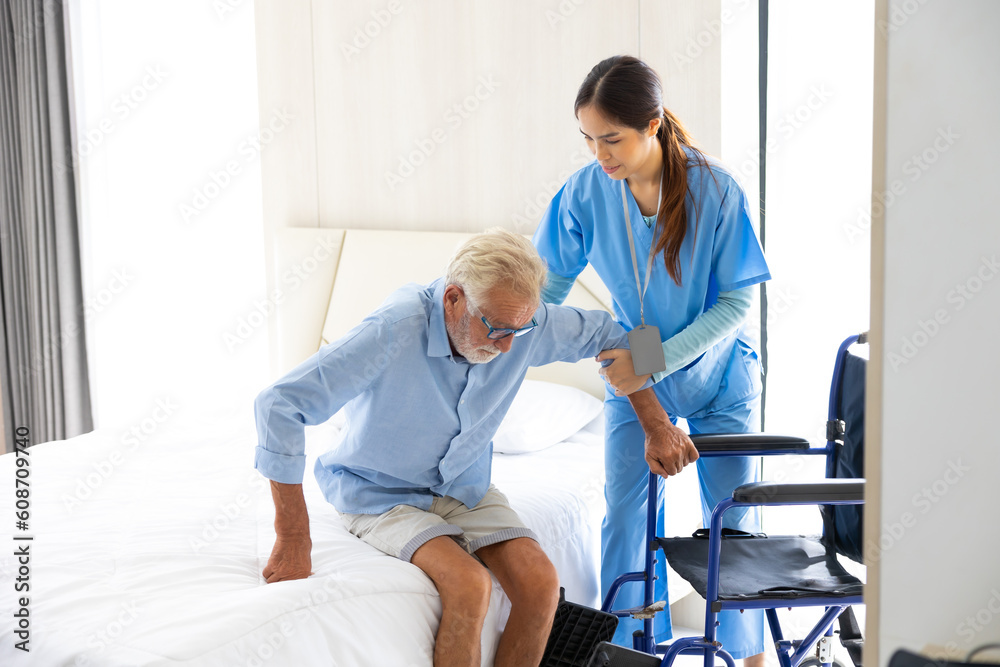 Female Nurse assisting senior patient at nursing home. Home care. disabled old man with walker at home. Professional caregiver nursing home Female Nurse assisting senior patient at nursing home. Home care. disabled old man with walker at home. Professional caregiver nursing home