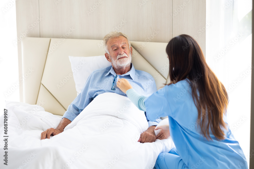 Nurse use stethoscope. Professional caregiver nursing visit elderly patient at home. Nurse assisting senior patient at nursing home. Nurse use stethoscope. Professional caregiver nursing visit elderly patient at home. Nurse assisting senior patient at nursing home.