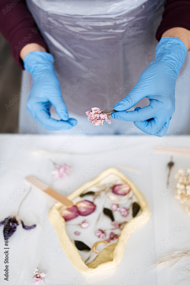 Epoxy Resin Art. Creating Art with Resin on workshop. The art process of creating epoxy resin handmade staff in art studio. Epoxy Resin Art. Creating Art with Resin on workshop. The art process of creating epoxy resin handmade staff in art studio.