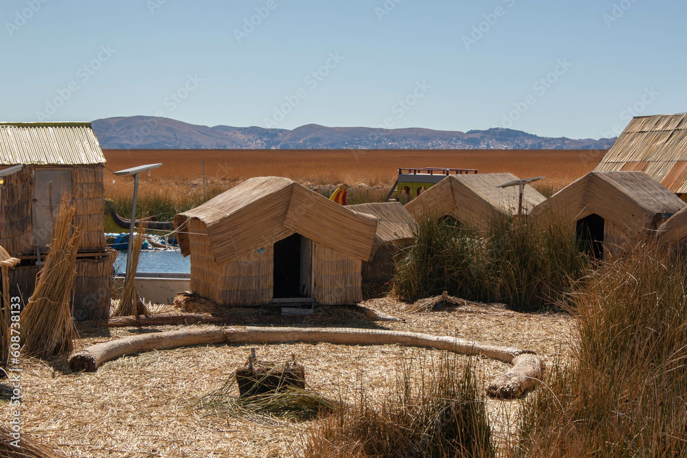 Typical house made of totora reeds, on the island of the uros, in Lake Titicaca. Typical houses made of totora reeds, on the island of the Uros, in Lake Titicaca, in Puno, Peru. Typical house made of totora reeds, on the island of the uros, in Lake Titicaca. Typical houses made of totora reeds, on the island of the Uros, in Lake Titicaca, in Puno, Peru.