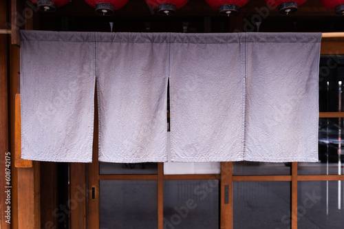The curtain-like fabric that hangs in front of traditional Japanese restaurants and shops not only serves as a signboard, but holds a larger meaning,