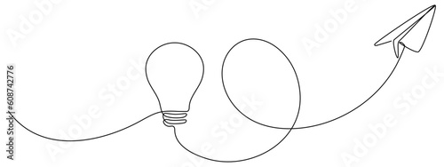 Lightbulb with flying paper plane continuous line drawing. Idea conceptual symbol. Vector illustration isolated on white. photo