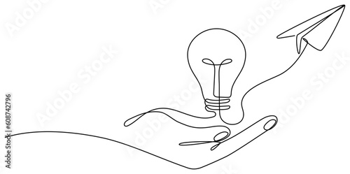 Hand holding light bulb and paper plane continuous line drawing.  Vector illustration isolated on white.