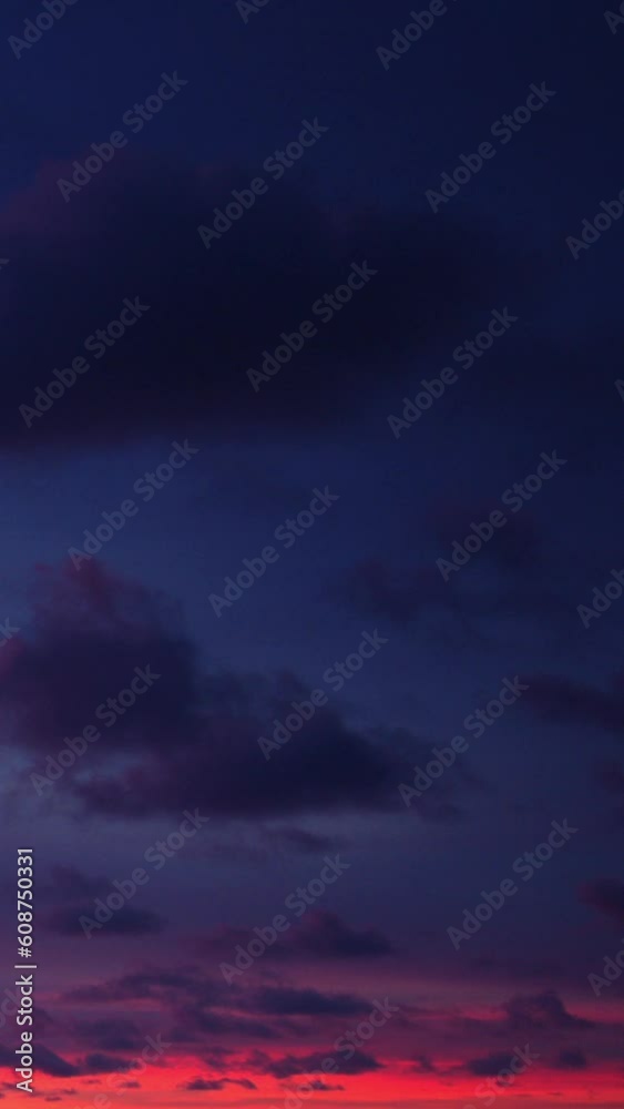 The morning sun set the clouds ablaze with a pink glow, creating a stunning vista that was hard to ignore. Vertical video. The morning sun set the clouds ablaze with a pink glow, creating a stunning vista that was hard to ignore. Vertical video.