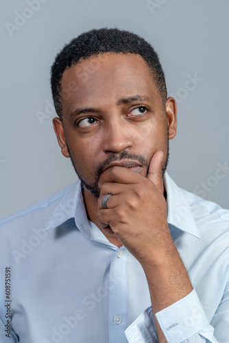 Portrait of a black man with a thinking look on his face