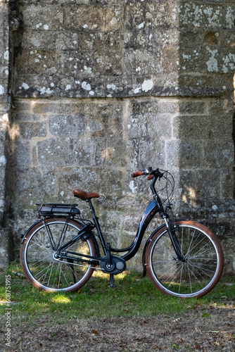 Retro bicycle by and old church © FrankBoston