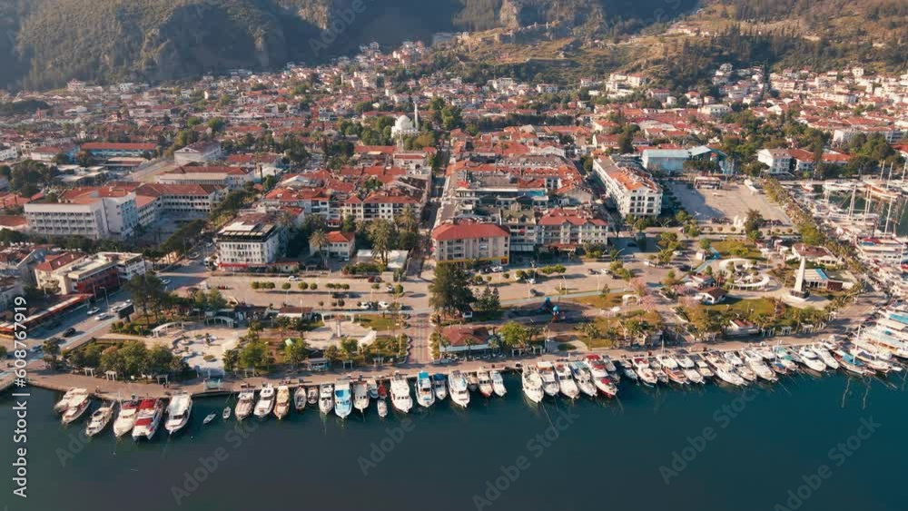 Drone flying over the sea and Fethiye town with yacht marina in Turkey Drone flying over the sea and Fethiye town with yacht marina in Turkey