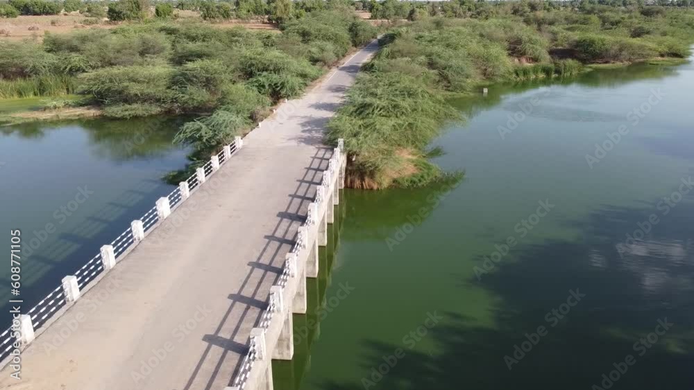 Indian Village River Between farm with a bridge drone view Indian Village River Between farm with a bridge drone view