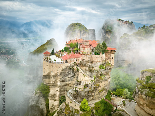 Meteora Varlaam Monastery rising out of the mist. Amazing mystical landscape.  A UNESCO heritage site. Meteora mountains  Thessaly  Greece.