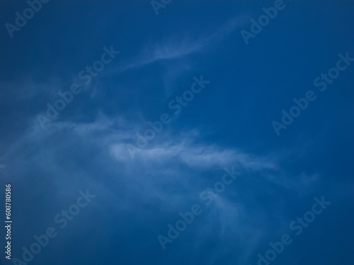 Photo of a blue sky with white clouds