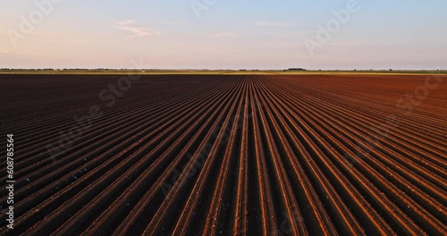 Aerial shot of a fertile arable agricultural industrial farm field