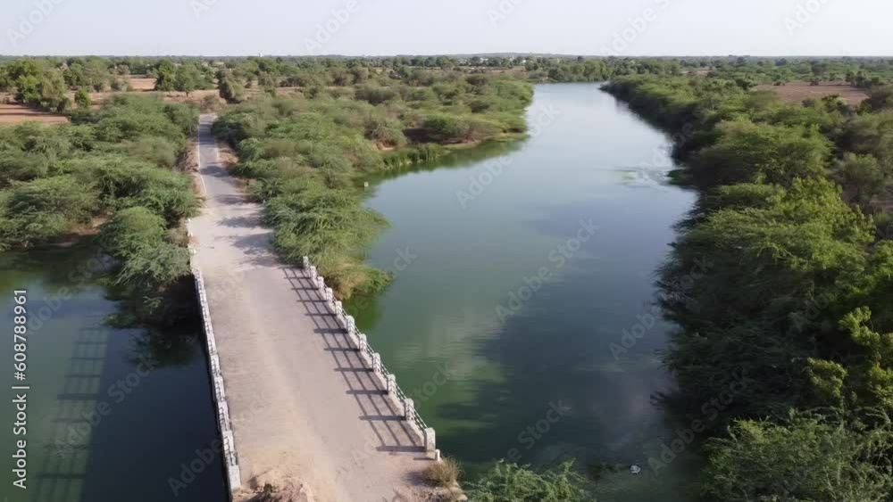 Indian River Between Farm with a Bridge Amazing Drone View Indian River Between Farm with a Bridge Amazing Drone View