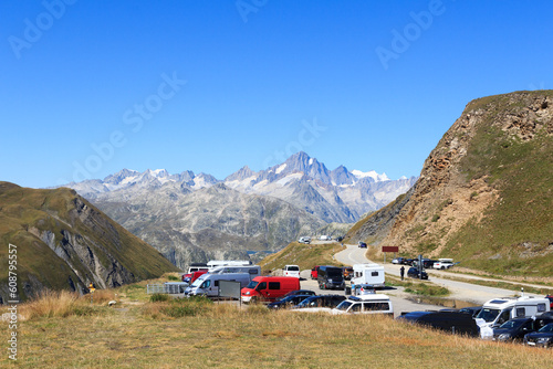 Panorama view with mountain Finsteraarhorn and Furka Pass parking lot in the Swiss Alps, Switzerland photo