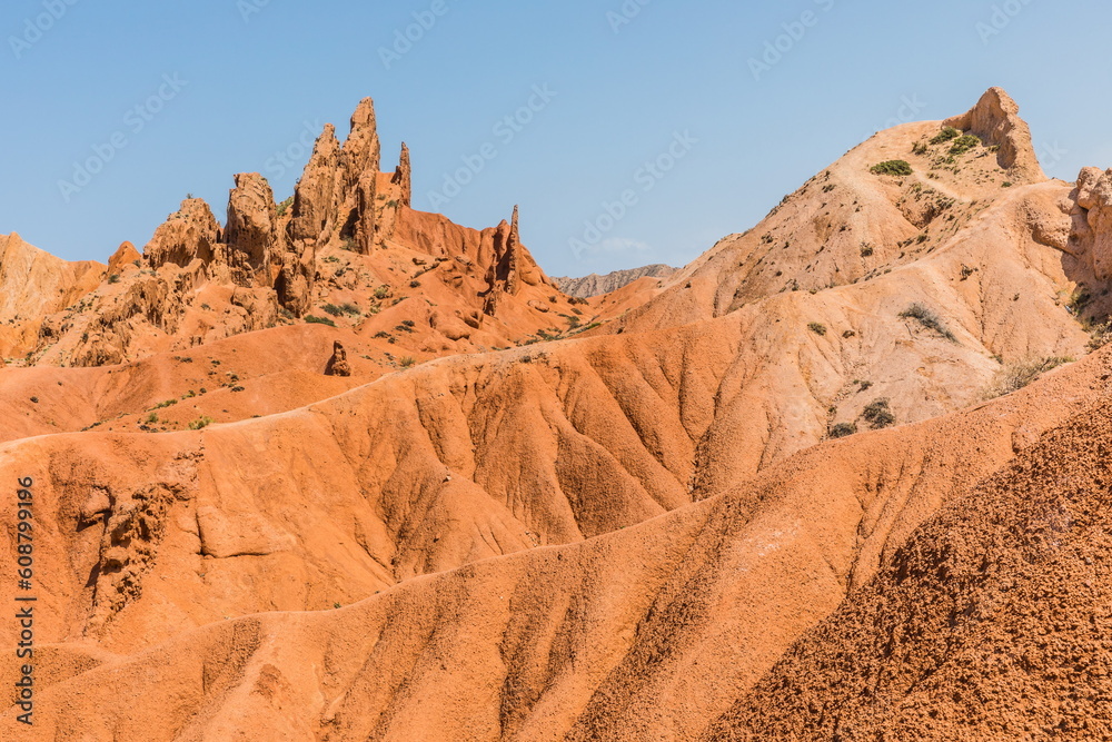 Skazka (Fairytale) Canyon - the most unusual and picturesque gorge on the southern shore of Issyk-Kul, the main attraction in the vicinity of the lake, Kyrgyzstan Skazka (Fairytale) Canyon - the most unusual and picturesque gorge on the southern shore of Issyk-Kul, the main attraction in the vicinity of the lake, Kyrgyzstan