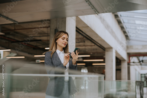 Young business woman using ...
