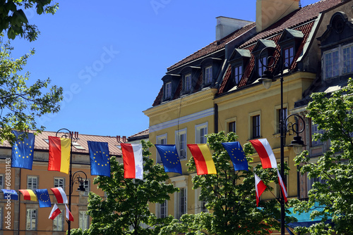 Warsaw, Poland. Krakowskie Przedmiescie street decorated with the flags of Poland and the European Union. Celebration of the anniversary of Poland's accession to the European Union photo