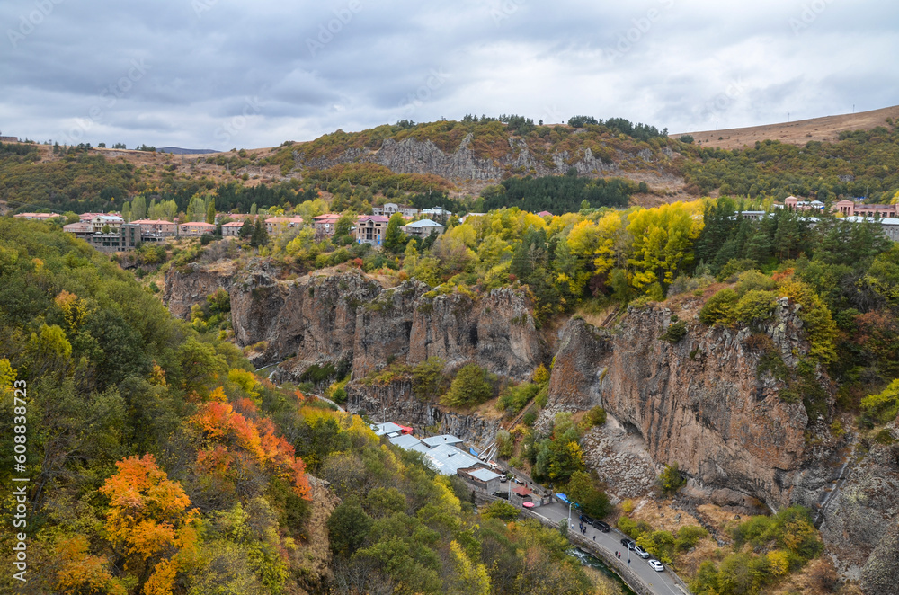 Colorful autumn view from the bridge to spa resort city Jermuk and canyon of Arpa river. Armenia
