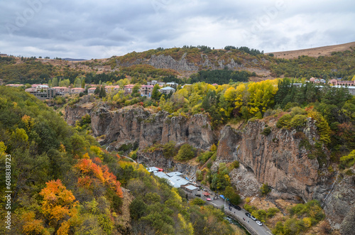 Colorful autumn view from the bridge to spa resort city Jermuk and canyon of Arpa river. Armenia
