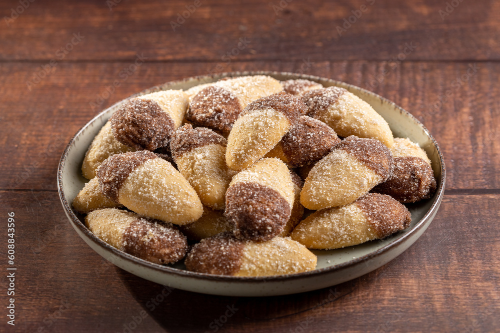 Shortbread biscuit covered with chocolate and crystallized sugar. In Brazil known as (Monteiro Lopes)