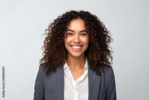 Portrait of smiling african american businesswoman with curly hair