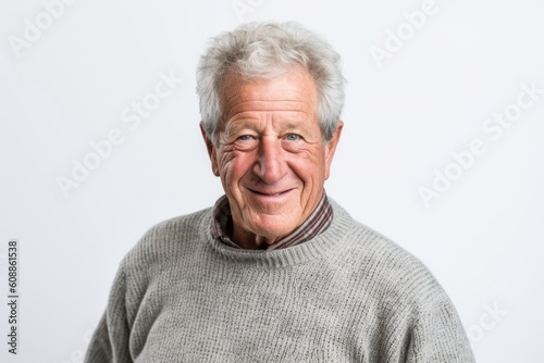 Group portrait photography of a satisfied man in his 60s that is wearing a cozy sweater against a white background . Generative AI © Eber Braun