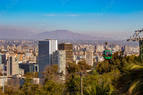 Chile, Santiago paisagem urbana com seu prédios, teleférico e a cordilheira dos andes encoberta photo
