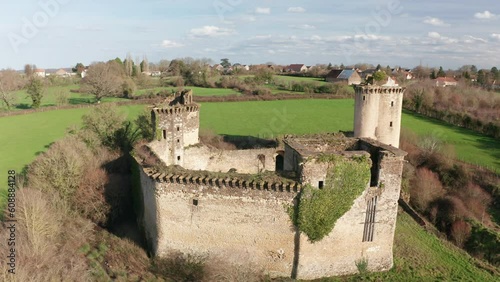 Aerial drone footage of the ruined Chateau de la Prune-au-Pot in Indre, central France. photo