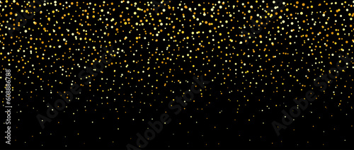 Photography Golden falling confetti on dark background