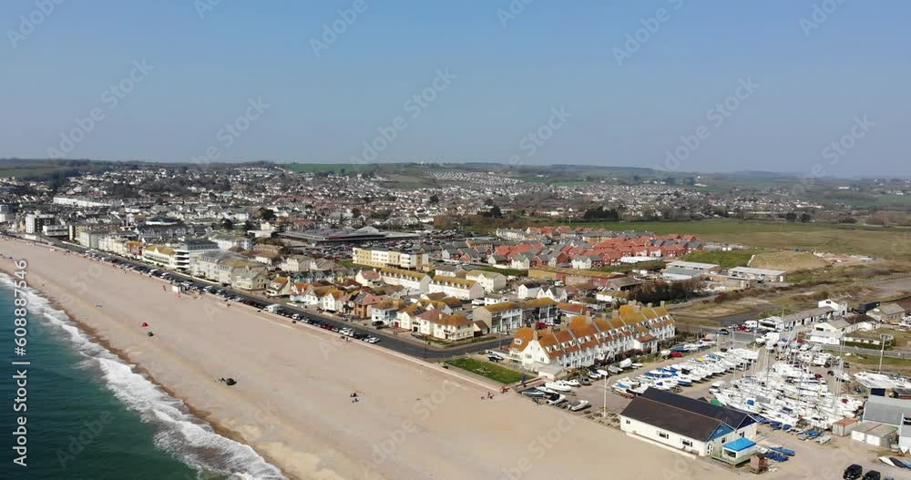 Aerial parallax shot of Seaton Town Beach and Harbour South West England on a cloudless summers day Aerial parallax shot of Seaton Town Beach and Harbour South West England on a cloudless summers day