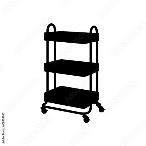 Silhouette of Kitchen cart or multifunction 3 tier rolling metal utility. Ideal for storing tools, utensils, supplies, food, beverages, toiletries. Icon vector illustration in trendy style.