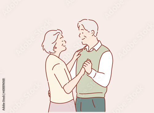 active elderly couple is dancing. happy elderly man and a woman hold hands and demonstrate dance moves. Hand drawn style vector design illustrations.