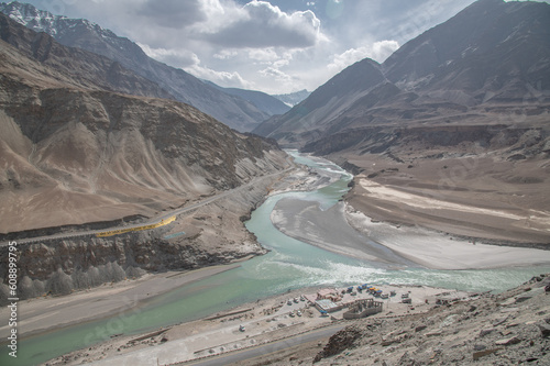 Sangam point. Sangam Valley is a 35 km (22 miles) drive from Leh,I ndia and is the confluence of the rivers Indus and Zanskar photo