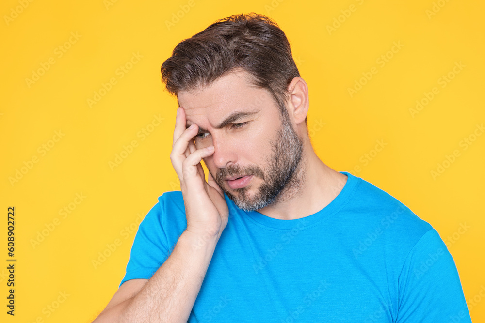 Man suffering from headache. Tired, headache and eye strain. Man with