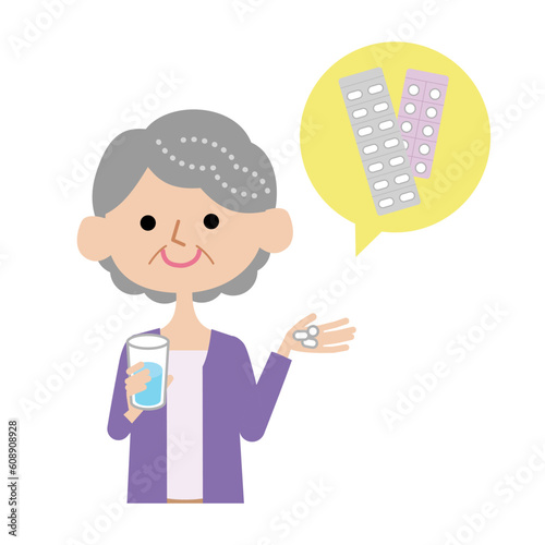 薬を飲むシニア女性