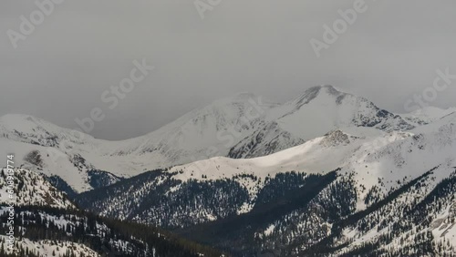 Rocky Mountains spring afternoon clouds rolling Timelapse Colorado Keystone Breckenridge Montezuma Loveland Pass Vail Copper Mountain Continential Divide snow peaks slowly afternoon daytime zoom out photo