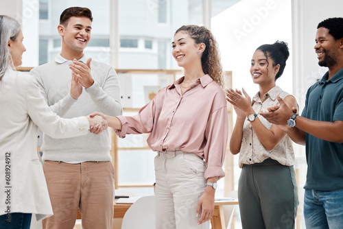 Handshake, clapping and business women in meeting success, celebration or CEO thank you, onboarding or hiring. Applause, mentorship and people shake hands in achievement, thanks and project promotion