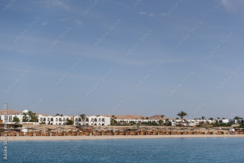 amazing resort at the red sea egypt with white buildings and palm trees on vacation detail