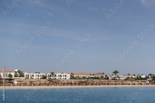 amazing resort at the red sea egypt with white buildings and palm trees on vacation detail