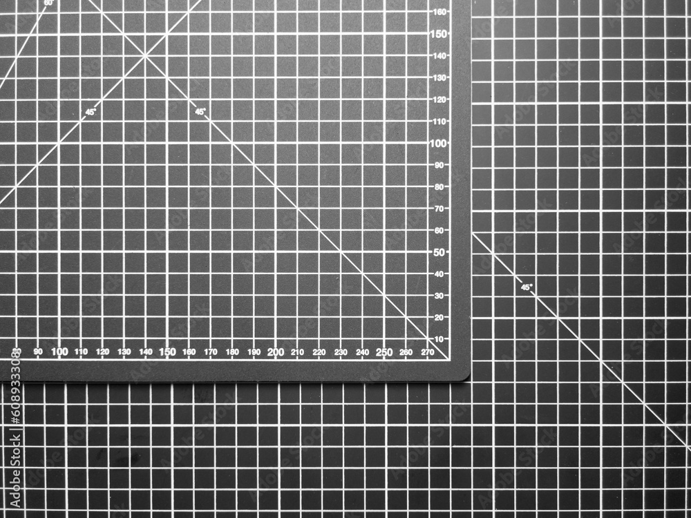Black and white cutting mat with grid and numbers, top view. foto de